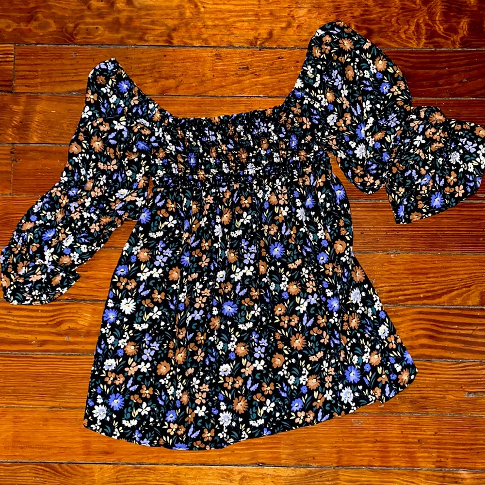 Black floral smocked peplum top